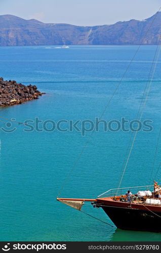 in europe greece santorini island hill and rocks on the summertime beach