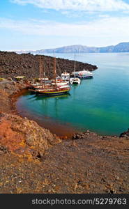 in europe greece santorini island hill and rocks on the summertime beach