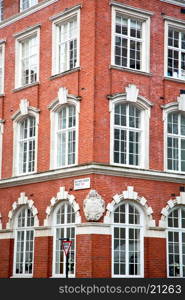 in europe london old red brick wall and historical window