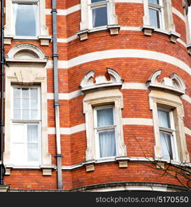 in europe london old red brick wall and historical window