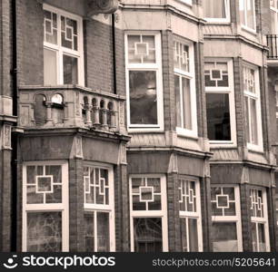 in europe london old red brick wall and historical window