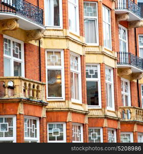 in europe london old red brick wall and historical window