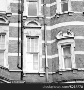 in europe london old red brick wall and historical window