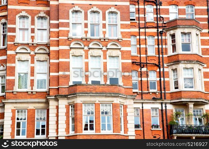 in europe london old red brick wall and historical window