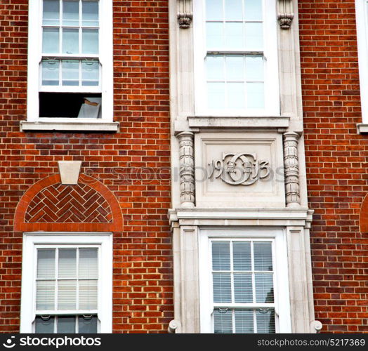 in europe london old red brick wall and historical window