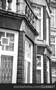 in europe london old red brick wall and historical window