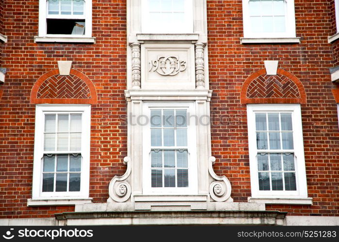 in europe london old red brick wall and historical window