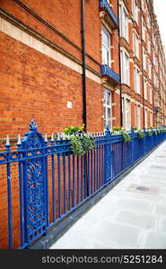 in europe london old red brick wall and historical window