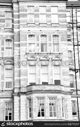 in europe london old red brick wall and historical window