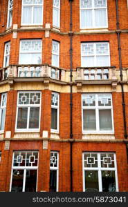 in europe london old red brick wall and historical window