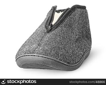 In front one piece the comfortable dark gray slipper isolated on white background