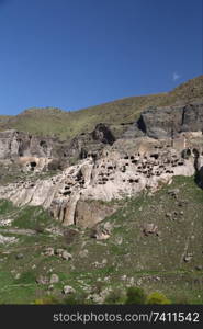  in georgia vardzia the view of the city  excavated in the rock cave and religion site in the mountain
