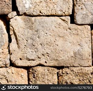 in greece abstract texture of a ancien wall and ruined brick