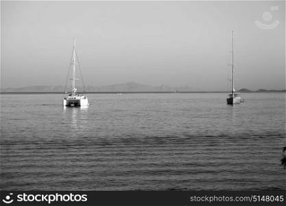 in greece near the coastline boat and yacht and sunrise light