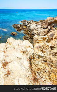 in greece the mykonos island rock sea and beach sky