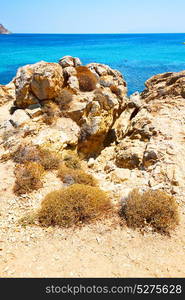 in greece the mykonos island rock sea and beach sky