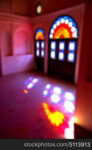 in iran blur colors from the windows the old mosque traditional scenic light