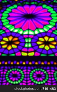 in iran blur colors from the windows the old mosque traditional scenic light