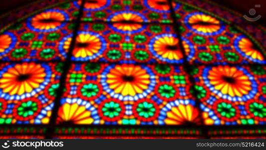 in iran blur colors from the windows the old mosque traditional scenic light