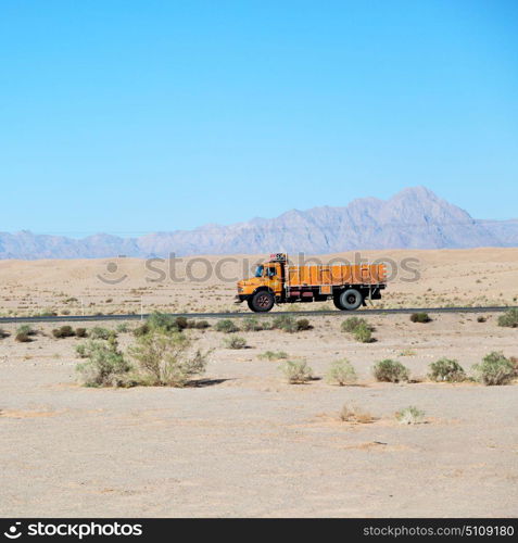 in iran blur mountain and landscape from the window of a car