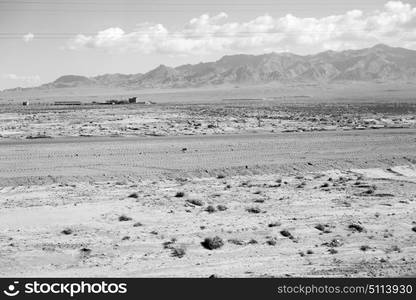 in iran blur mountain and landscape from the window of a car