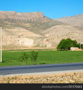 in iran blur mountain and landscape from the window of a car