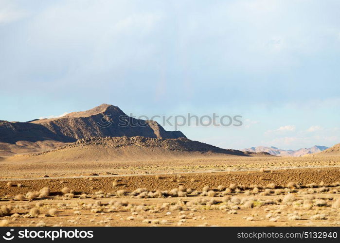 in iran blur mountain and landscape from the window of a car