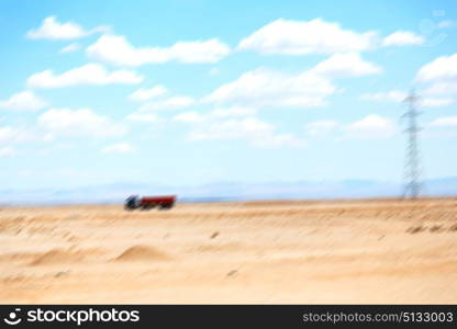 in iran blur mountain and landscape from the window of a car