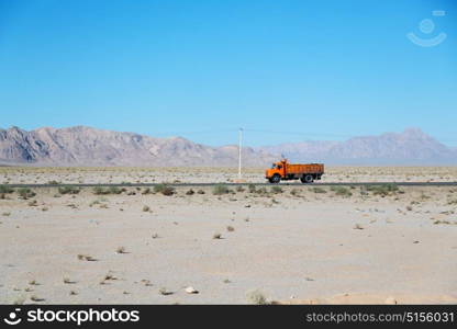 in iran blur mountain and landscape from the window of a car