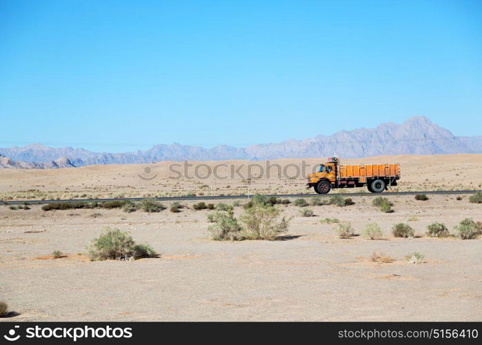 in iran blur mountain and landscape from the window of a car