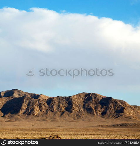 in iran blur mountain and landscape from the window of a car