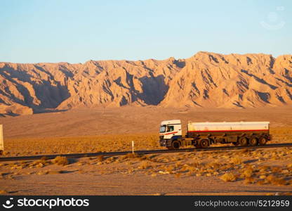 in iran blur mountain and landscape from the window of a car