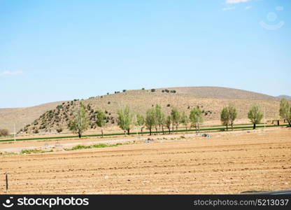 in iran blur mountain and landscape from the window of a car