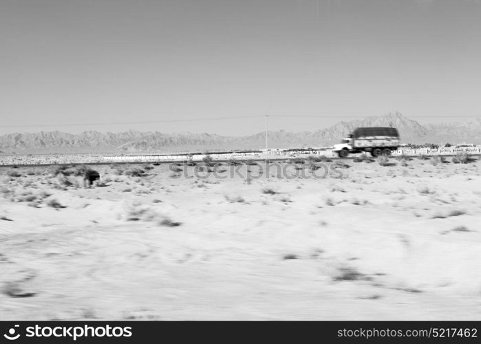 in iran blur mountain and landscape from the window of a car