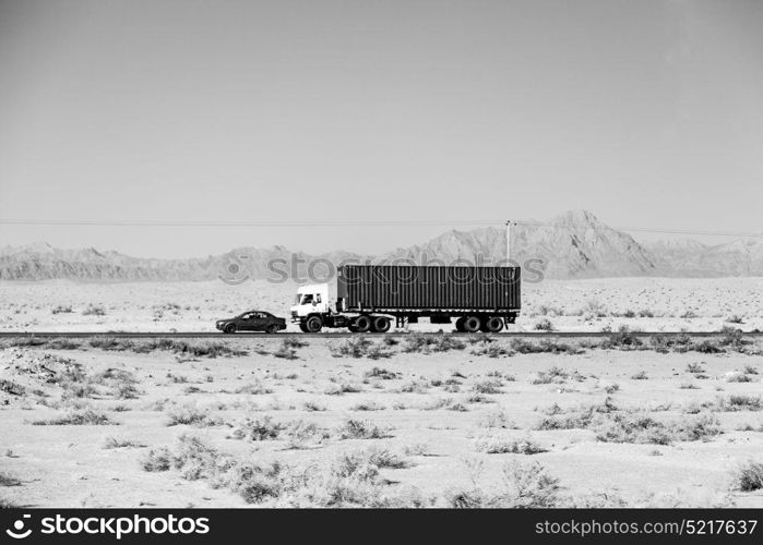 in iran blur mountain and landscape from the window of a car