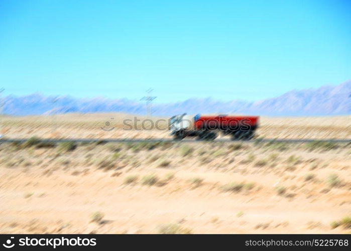 in iran blur mountain and landscape from the window of a car