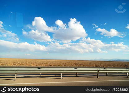 in iran blur mountain and landscape from the window of a car