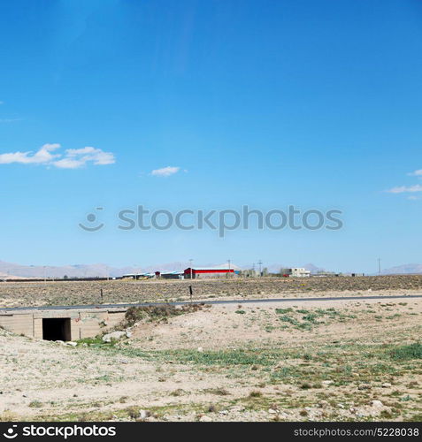 in iran blur mountain and landscape from the window of a car