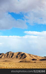 in iran blur mountain and landscape from the window of a car