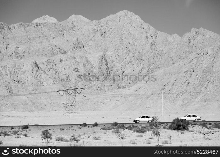 in iran blur mountain and landscape from the window of a car