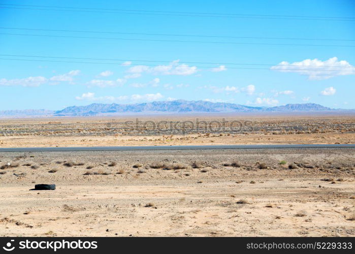 in iran blur mountain and landscape from the window of a car