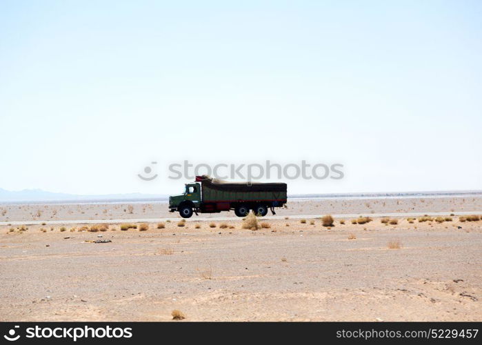 in iran blur mountain and landscape from the window of a car