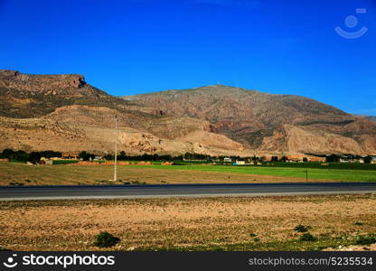 in iran blur mountain and landscape from the window of a car