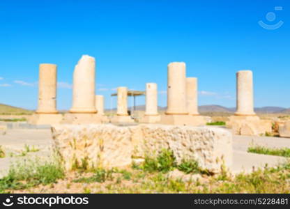 in iran pasargad the old construction temple and grave column blur