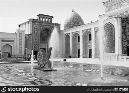 in iran the old mosque and traditional wall tile incision near fountain minaret