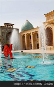 in iran the old mosque and traditional wall tile incision near fountain minaret