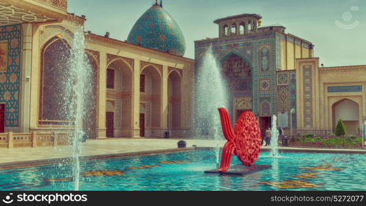 in iran the old mosque and traditional wall tile incision near fountain minaret