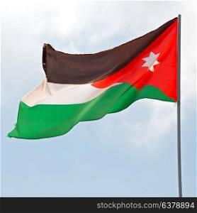 in jordan the national flag in the wind and sky