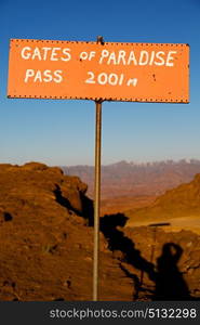 in lesotho road sign gate of paradise pass mountain destination