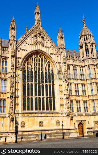 in london old historical parliament glass window structure and sky